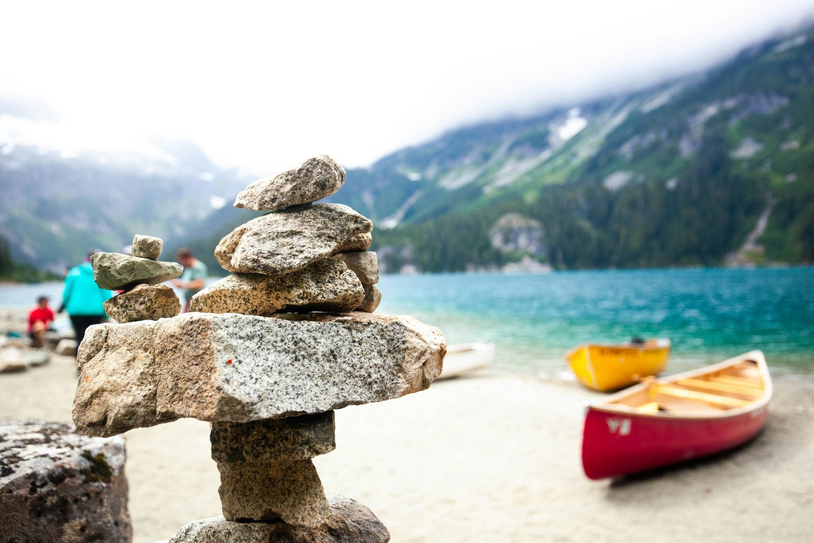 selective focus photography of cairn stone at daytime